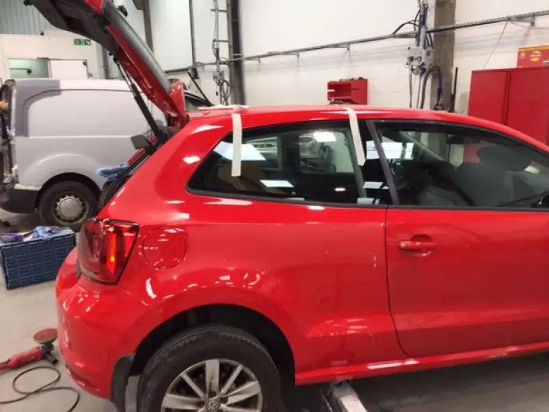 remove and refit rear quarter on a VW polo at Nottingham JCC body shop.: Swipe To View More Images